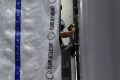 Workers begin removing Trump’s name from the Kennedy Center