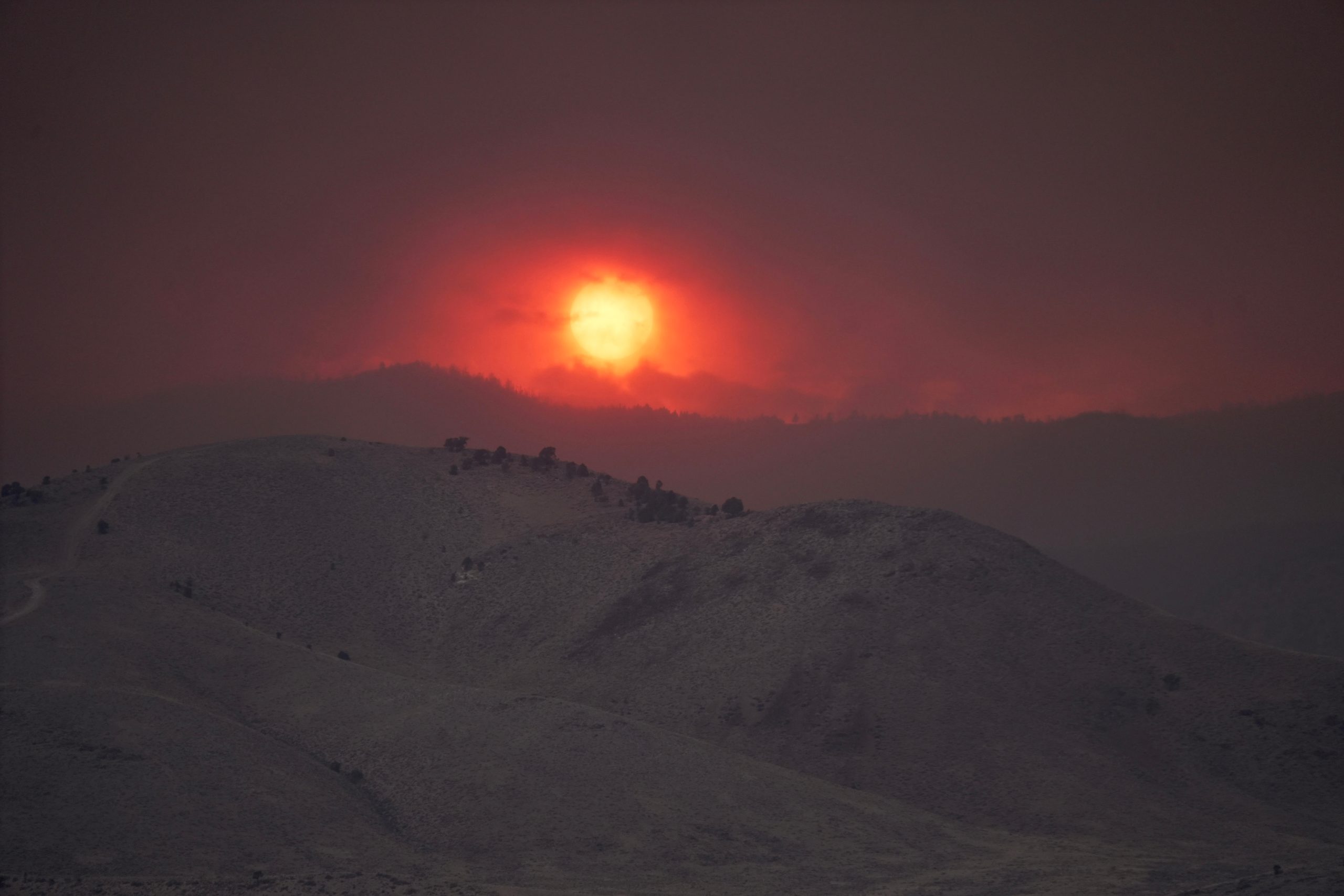 Critical fire weather complicates firefighting efforts in massive Utah wildfire