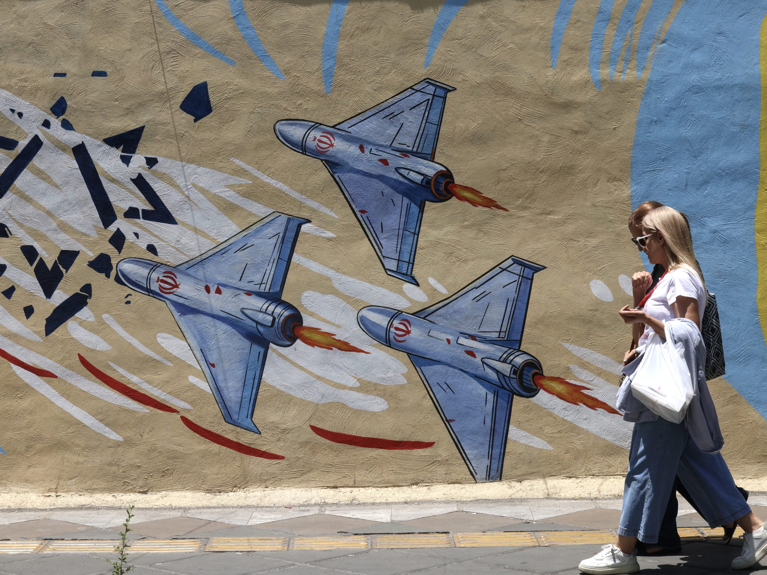 Israel-Iran strikes threaten truce. And, Ebola is spreading at an unprecedented rate