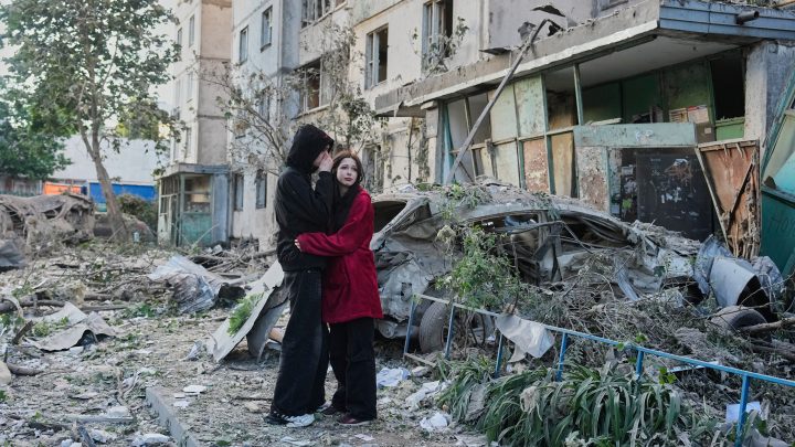 Russian attack on Ukraine kills at least 11 and traps others in damaged buildings