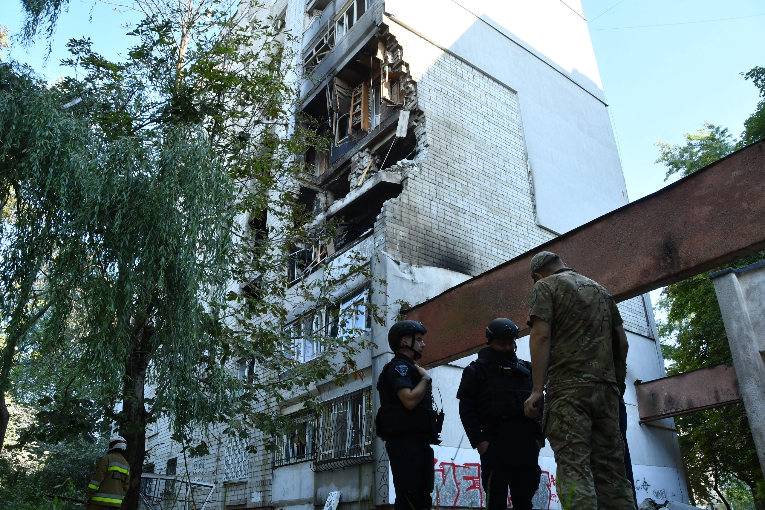 Russian strikes across Ukraine kill 10 and a missile falls in Poland