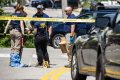 In the aftermath of deadly shootings, ICE pauses most traffic stops